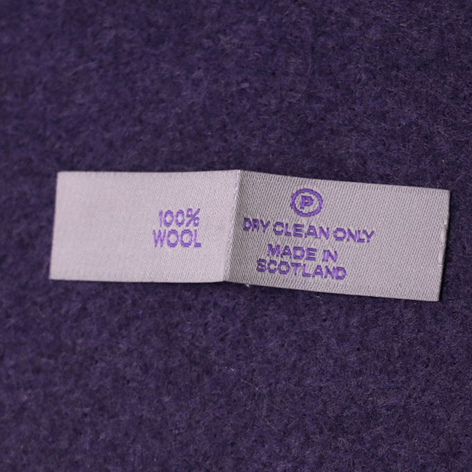 L'indumento personale cuce nella piegatura concentrare del popolare dell'estremità delle etichette del tessuto